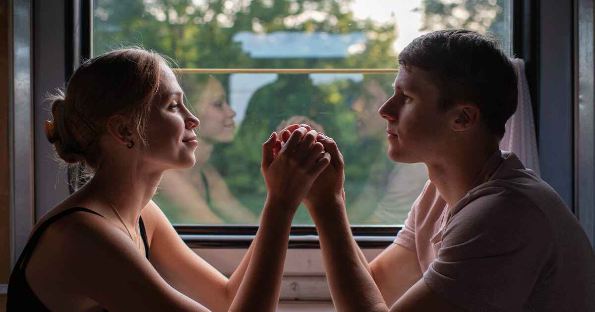 Couple sitting together and having a serious conversation about pregnancy options